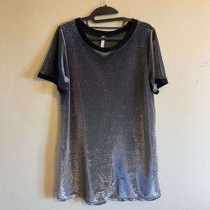 Sparkly, sheer top with black bandeau.